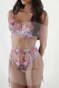 London escort Khloe wearing flowery lingerie