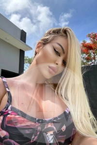 London escort Krissy wearing a flowery bra