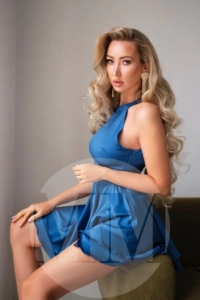 Dubai escort Masha wearing a blue dress